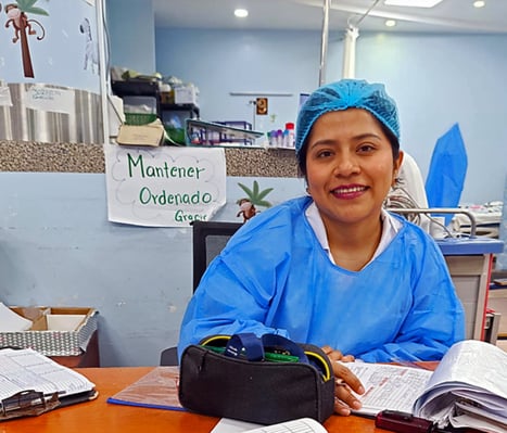 Young nurse, Milagros, smiles while working at a regional hospital in rural Guatemala.
